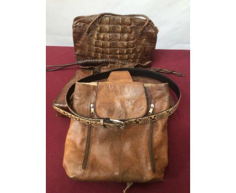 Two Aligator skin bags and Veritable leather bag, snake skin belt and a whip.