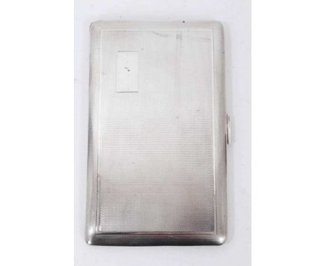 Silver cigarette case of rectangular form with engine turned decoration (Birmingham, 1965)Condition report: Weight 6.83oz