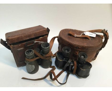 Pair of First World War Imperial German binoculars by Carl Zeiss, in original brown leather case with paper label to interior