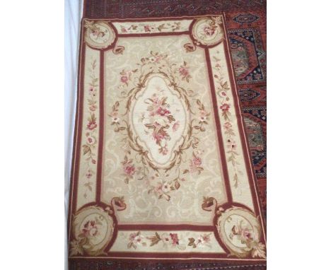Hand woven tapestry rug/ wall hanging and similar needle point rug, both floral design.Condition report: Hand woven rug dimen