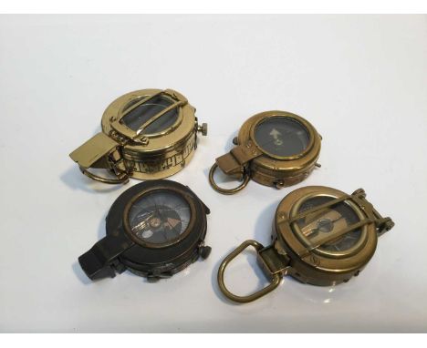 Edwardian brass military compass by J.H. Steward, dated 1902, named to E.W. Chadwick on reverse, together with a First World 