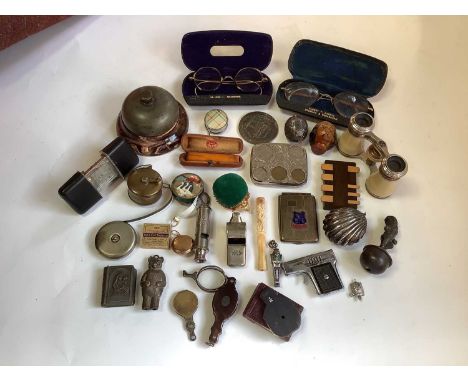 A group of antique and later collectables, including novelty tape measures, opera glasses, trinket boxes, whistles, spectacle