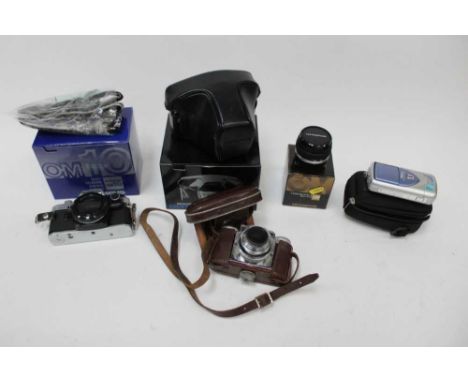 Quantity of cameras, video cameras and accessories, including a Nikon F80, Sony and Minolta digital cameras, Panasonic camcor