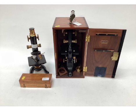 Lacquered brass Watson Service microscope in mahogany case, together with a Watson Kima microscope and a French student's mic