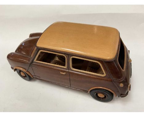 Scratch built wooden scale model of a mini, elaborately detailed with hinged seats, 37cm long