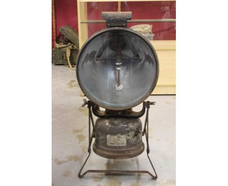 Second World War floodlight projector lamp on pivoting stand, by Tilley, Hendon, approximately 76cm in height.Condition repor