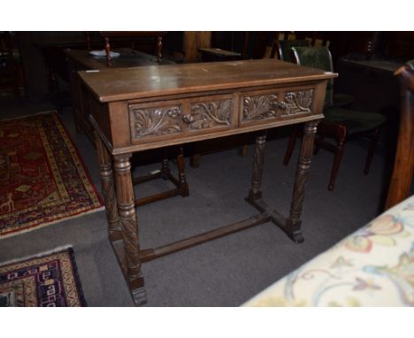 Oak two-drawer side table^ raised on fluted and wrythen supports joined below by an |H| stretcher^ 91.5cm wide
