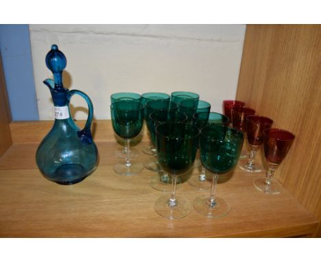 GREEN GLASS CARAFE AND COVER WITH TEN GREEN COLOURED WINE GLASSES AND FOUR RUBY COLOURED GLASSES