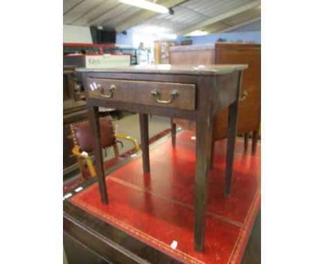 Late 18th/early 19th century oak side table with single frieze drawer on chamfered square supports^ 63.5cm wide
