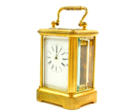 A French miniature brass cased carriage clock, enamel dial bearing Roman numerals, single barrel movement, impressed AB Depos