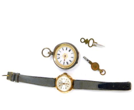 A lady's 9ct gold cased wristwatch, circular silvered dial bearing Arabic numerals, Swiss movement, on a leather strap, Chest