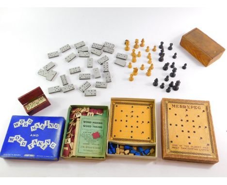 A small vintage box wood Staunton style chess set, with box, a set of Franklyn's Fine Shagg Tobacco dominoes, a Merrypeg boxe