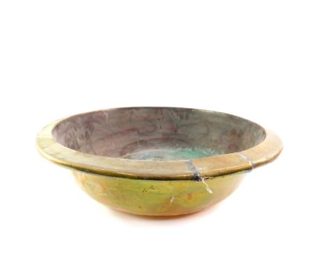 A vintage brass dough bowl, 48cm wide.