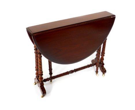A Victorian mahogany Sutherland table, raised on turned legs united by a turned stretcher, on ceramic castors, 67cm high, 81.