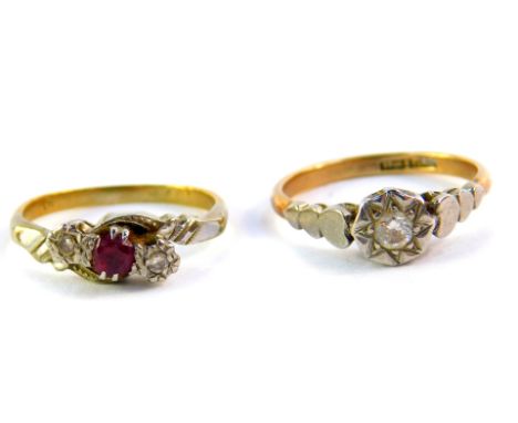 An 18ct gold platinum and diamond solitaire ring, illusion set, size L, together with a ruby and diamond three stone ring in 