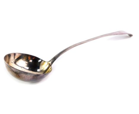 A George III silver soup ladle, with a beaded rim, Thomas Northcote, London 1783, 5.91oz, 35.5cm long. 