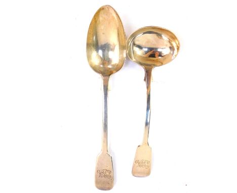 A Victorian silver cream ladle, together with a table spoon, both monogram engraved, Henry Lias &amp; Son, London 1874 and 18