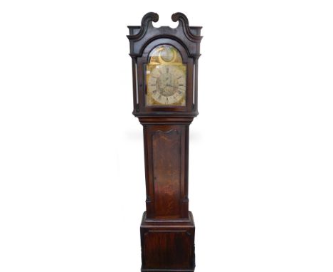 A Georgian oak longcase clock by Samuel Lister of Halifax, the brass break arch dial with rococo shell and sea serpent spandr