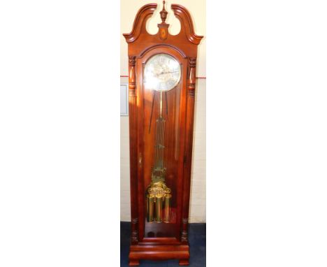 A Millennium mahogany finished long case clock, with broken arch pediment, oval shell paterae, full length reeded column side