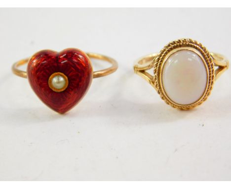 A seed pearl and red enamel heart shaped ring, on a yellow metal mount, size O, together with a 9ct gold and opal ring, size 