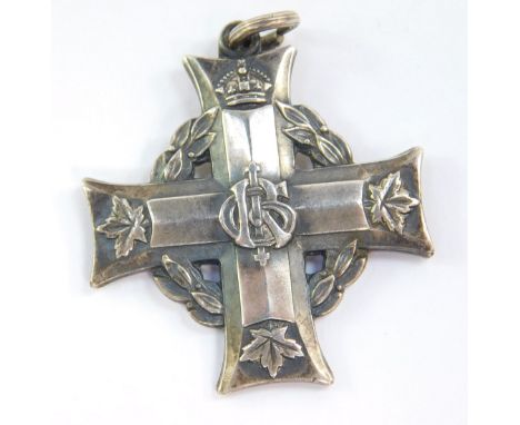 A WWI Canadian silver memorial cross, The Silver Cross For Mothers, named to L'Cpl. C R Hawkes, 2024858. Lance Corporal Charl