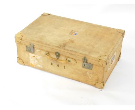 A vintage mid 20thC pig skin suitcase bearing initials KMH, traces of shipping labels including Bergen Line, 73cm wide, 47cm 