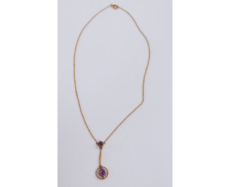A Victorian Art Nouveau amethyst pendant, set in yellow metal, stamped 9ct, on a belcher link neck chain, on a bolt ring clas