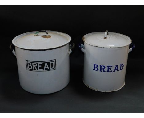 Two cylindrical enamel bread bins.