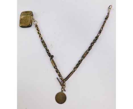 A George V silver vesta case, foliate engraved, shield reserve, Chester 1911, on a silver fancy link Albert chain, with T-bar