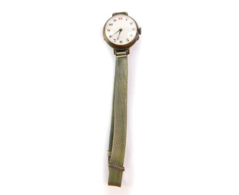 A lady's early 20thC silver cased wristwatch, circular enamel dial bearing Arabic numerals, Continental movement, on a mesh s