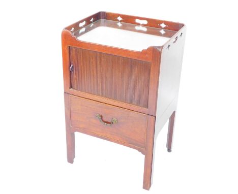 A Georgian mahogany tray top commode, with a tambour front compartment over a pull out drawer with ceramic insert and wooden 