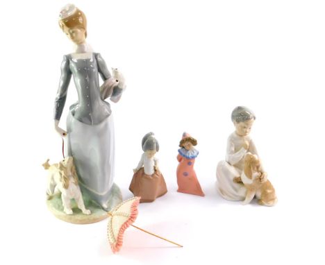 A Lladro porcelain figure modelled as a lady with a dog and parasol, 39cm high (AF), together with a Lladro porcelain figure 