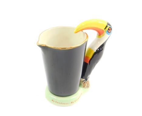 A Carltonware pottery My Goodness My Guiness jug, modelled with a toucan handle, printed mark, 18.5cm high. 