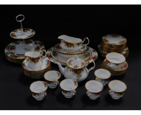 A Royal Albert porcelain tea service, decorated in the Old Country Roses pattern, comprising bread plate, tea pot, cream jug 