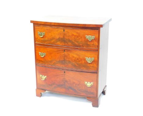 A George III mahogany bow front chest, of three long graduated drawers, raised on bracket feet, 88cm high, 77cm wide, 43cm de