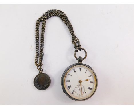 A George V silver cased gentleman's pocket watch, open faced, key wind, enamel dial bearing Roman numerals, subsidiary second