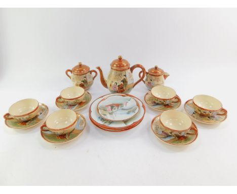 A Japanese earthenware coffee service, painted with figures on a terrace, together with porcelain plates and a saucer of simi