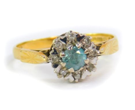 An 18ct gold aquamarine and diamond ring, claw set, size N, 2.9g.