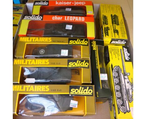 A quantity of vintage solido military die-cast vehicles including; a Kaiser Jeep, a Leopard tank, a half track M3 and five ot