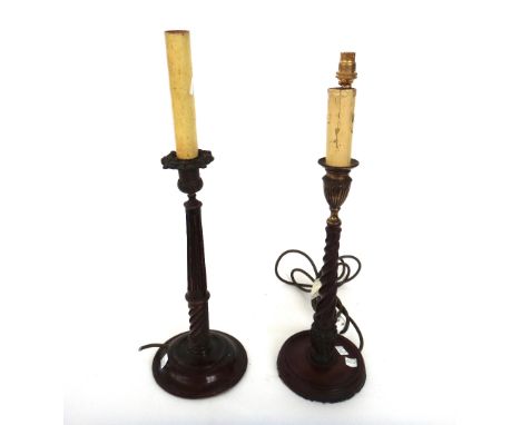 A pair of Georgian style mahogany candlestick table lamps, 20th century, with spiral twist shaft and gilt metal urn shaped ca