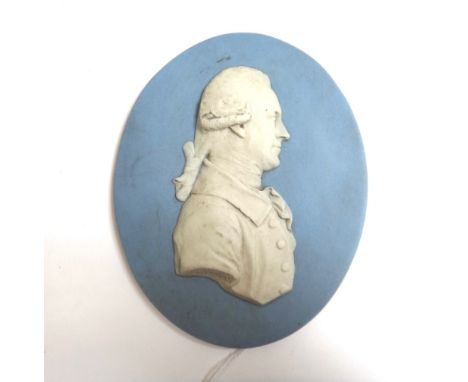 An oval Wedgwood blue jasper portrait medallion by Flaxman, depicting Herschel in relief, impressed 'Wedgwood' and inscribed 