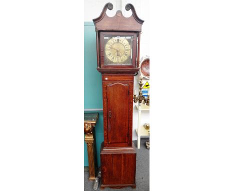 An 18th century eight day longcase clock, the square eleven inch dial with day and month aperture and corner spandrels signed