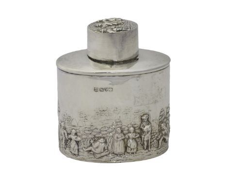 A silver oval tea caddy, the body and the detachable cover decorated with country folk, in a landscape scene in the Dutch tas