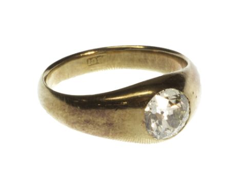 A gold and diamond set single stone ring, gypsy set with a cushion shaped diamond, detailed 18 CT, the diamond weighs approx 