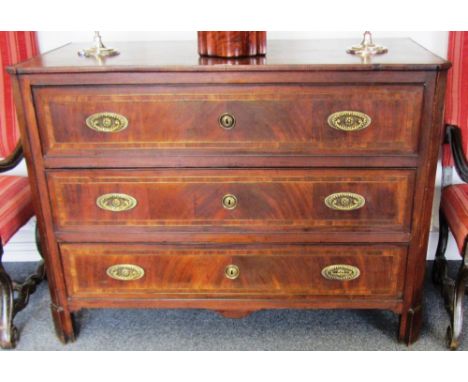 An 18th century European mahogany three drawer commode with canted corners and block feet, 113cm wide. 