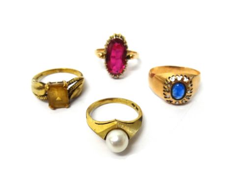 A 9ct gold ring, claw set with a cut cornered rectangular step cut citrine, a gold ring mounted with a cultured pearl, a gold