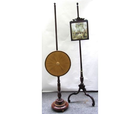 A George III mahogany pole screen on tripod base, together with a Regency gilt metal mounted faux rosewood pole screen.