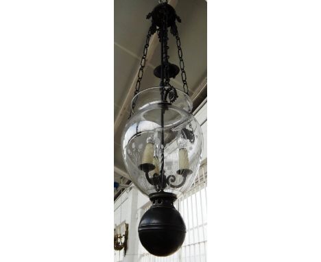 An etched glass and metal mounted hall lantern, late 19th/ early 20th century, with foliate cast boss over suspensions chains