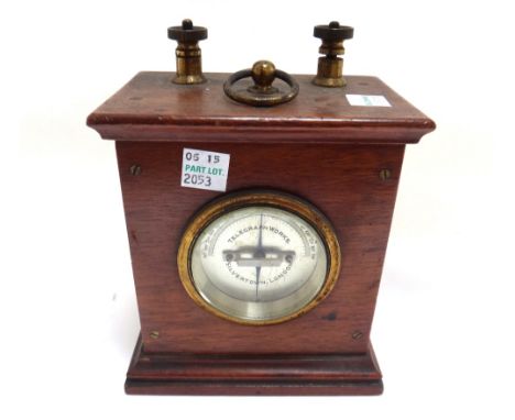 A Singers patent gimbal compass in a fitted case (8.5cm) , a Telegraph Works' voltmeter, a military clinometer, a pocket volt