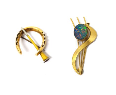 A gold brooch, designed as a hunting horn within a horseshoe, detailed 15 C and a gold and opal doublet set brooch, designed 